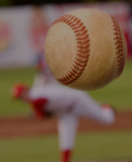 Student training at a baseball stadium