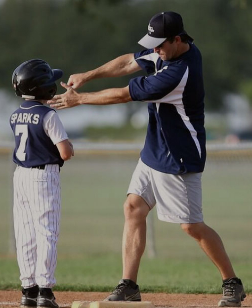 A boy at a baseball training class